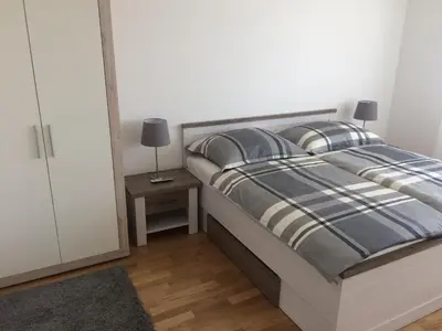 Ein Bett oder Betten in einem Zimmer der Unterkunft Vienna Hauptbahnhof Apartments 1