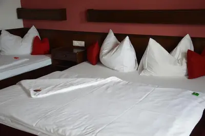 Ein Bett oder Betten in einem Zimmer der Unterkunft Gästehaus Schmidt