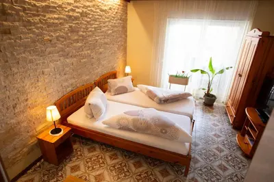 Ein Bett oder Betten in einem Zimmer der Unterkunft Gästehaus Mariola