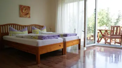 Ein Bett oder Betten in einem Zimmer der Unterkunft Gästehaus Mariola