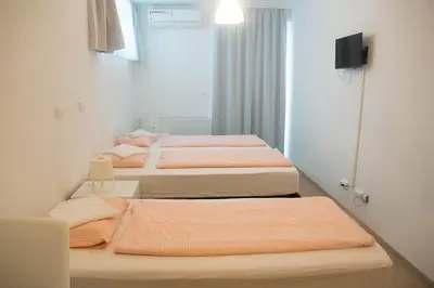 Ein Bett oder Betten in einem Zimmer der Unterkunft Hauptbahnhof