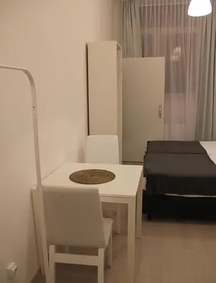 Ein Bett oder Betten in einem Zimmer der Unterkunft Hauptbahnhof