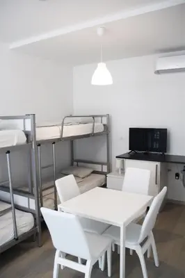 Ein Bett oder Betten in einem Zimmer der Unterkunft Hauptbahnhof