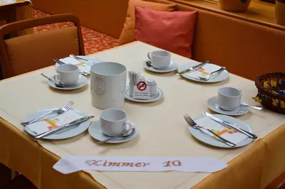 Ein Restaurant oder anderes Speiselokal in der Unterkunft Die Pension Reeh