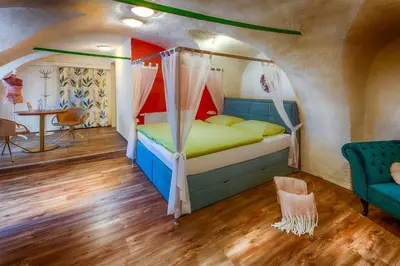 Ein Bett oder Betten in einem Zimmer der Unterkunft Turmhof Breitenbrunn
