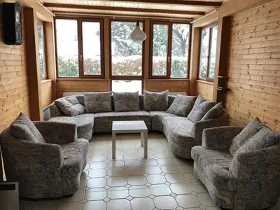 Ein Sitzbereich in der Unterkunft House at Lake 