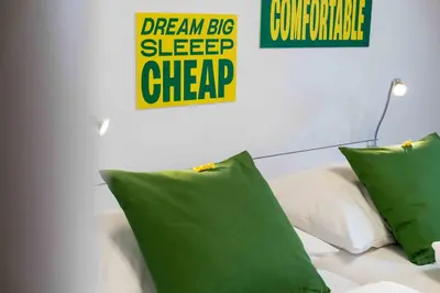 Ein Bett oder Betten in einem Zimmer der Unterkunft SLEEEP Hotel Wiener Neudorf