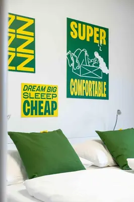 Ein Bett oder Betten in einem Zimmer der Unterkunft SLEEEP Hotel Wiener Neudorf