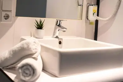 Ein Badezimmer in der Unterkunft SLEEEP Hotel Wiener Neudorf