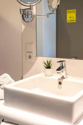 Ein Badezimmer in der Unterkunft SLEEEP Hotel Wiener Neudorf