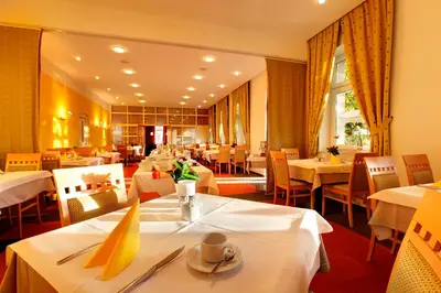 Ein Restaurant oder anderes Speiselokal in der Unterkunft Strandhotel Alte Donau