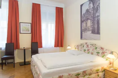 Ein Bett oder Betten in einem Zimmer der Unterkunft Pension Lehrerhaus
