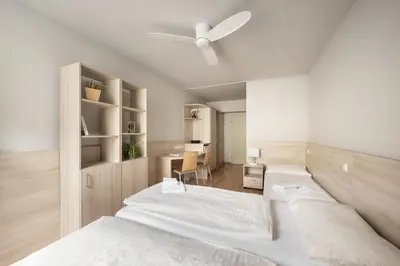 Ein Bett oder Betten in einem Zimmer der Unterkunft myNext - Hotel Rudy