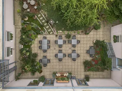 Ein Garten an der Unterkunft myNext - Hotel Rudy