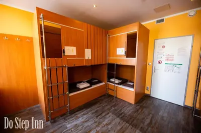 Ein Bett oder Betten in einem Zimmer der Unterkunft Do Step Inn Central - Self-Service-Hostel