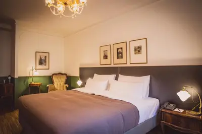 Ein Bett oder Betten in einem Zimmer der Unterkunft HENRI Hotel Wien