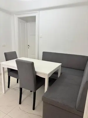 Ein Sitzbereich in der Unterkunft Carlton Suites