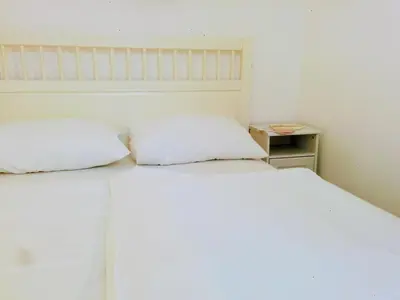 Ein Bett oder Betten in einem Zimmer der Unterkunft Haus Max