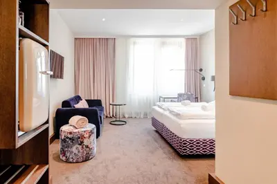 Ein Bett oder Betten in einem Zimmer der Unterkunft Hotel Eitljörg