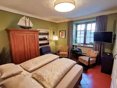 Ein Bett oder Betten in einem Zimmer der Unterkunft Gästehaus Doris