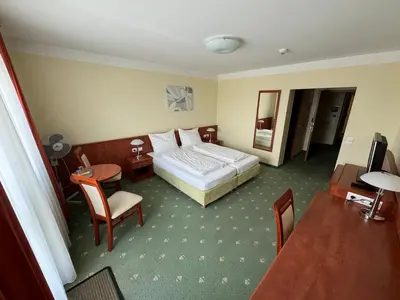 Ein Bett oder Betten in einem Zimmer der Unterkunft Hotel Breitenlee