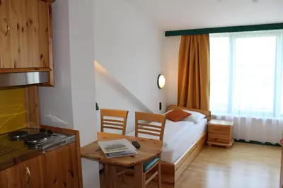 Ein Bett oder Betten in einem Zimmer der Unterkunft Hotel Asperner Löwe