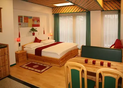 Ein Bett oder Betten in einem Zimmer der Unterkunft Hotel Asperner Löwe