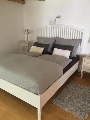 Ein Bett oder Betten in einem Zimmer der Unterkunft Gute Stube