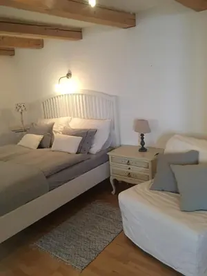 Ein Bett oder Betten in einem Zimmer der Unterkunft Gute Stube