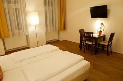 Ein Bett oder Betten in einem Zimmer der Unterkunft Apartment Nestroygasse