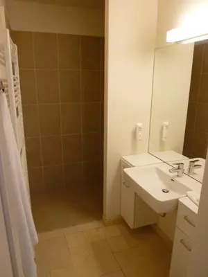Ein Badezimmer in der Unterkunft Apartment Nestroygasse