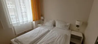 Ein Bett oder Betten in einem Zimmer der Unterkunft Apartment Nestroygasse