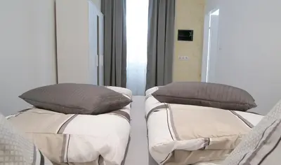 Ein Bett oder Betten in einem Zimmer der Unterkunft Laguna Apartment