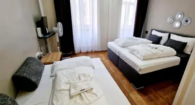 Ein Bett oder Betten in einem Zimmer der Unterkunft Aparthotel LAAERBERG