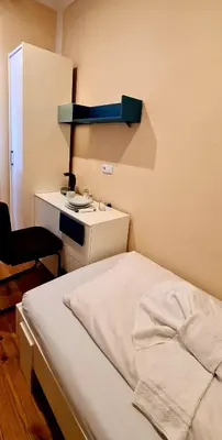 Ein Bett oder Betten in einem Zimmer der Unterkunft Aparthotel LAAERBERG