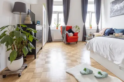 Ein Bett oder Betten in einem Zimmer der Unterkunft Yeshello Vienna Central Station Apartment