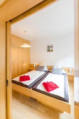 Ein Bett oder Betten in einem Zimmer der Unterkunft Appartmenthaus Josefikeller