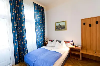 Ein Bett oder Betten in einem Zimmer der Unterkunft Hotel-Pension Bleckmann