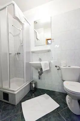 Ein Badezimmer in der Unterkunft Hotel-Pension Bleckmann