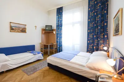Ein Bett oder Betten in einem Zimmer der Unterkunft Hotel-Pension Bleckmann