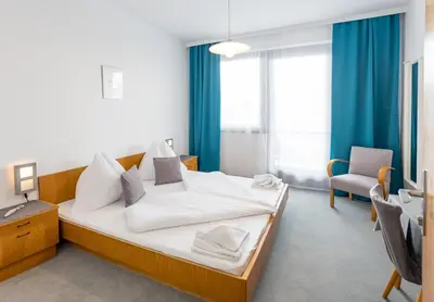 Ein Bett oder Betten in einem Zimmer der Unterkunft Ferienherbergen S & J Zeisz