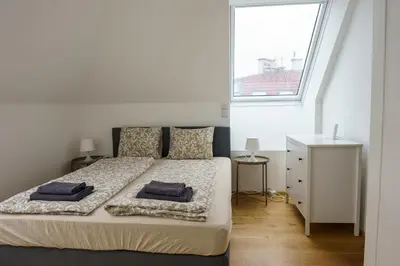 Ein Bett oder Betten in einem Zimmer der Unterkunft Vienna City Apartments Belvedere
