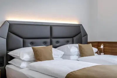 Ein Bett oder Betten in einem Zimmer der Unterkunft IMLAUER Hotel Nestroy Wien