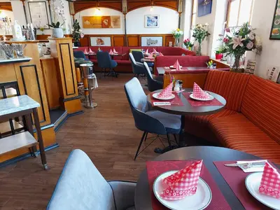 Ein Sitzbereich in der Unterkunft Hotel König