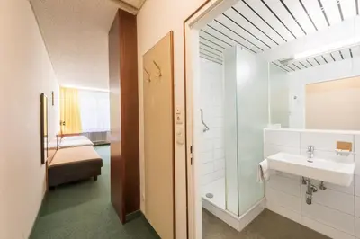 Ein Badezimmer in der Unterkunft Benediktushaus im Schottenstift