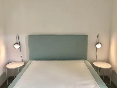 Ein Bett oder Betten in einem Zimmer der Unterkunft See-Apartment Weiden
