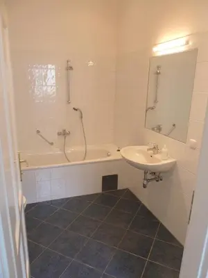 Ein Badezimmer in der Unterkunft Sobieski District-1 Ring Apartments