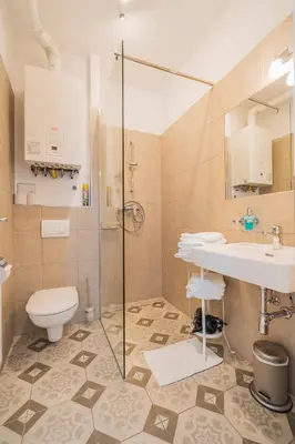 Ein Badezimmer in der Unterkunft La Perla Vintage-Apartments