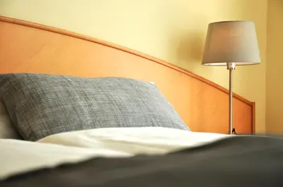 Ein Bett oder Betten in einem Zimmer der Unterkunft Gästehaus Hofer