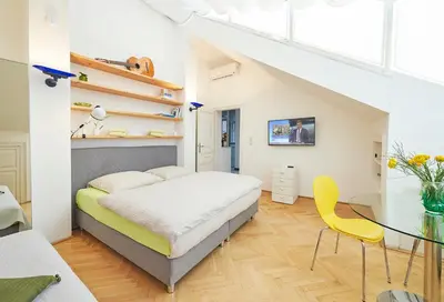 Ein Bett oder Betten in einem Zimmer der Unterkunft Penthouse im❤️Wiens